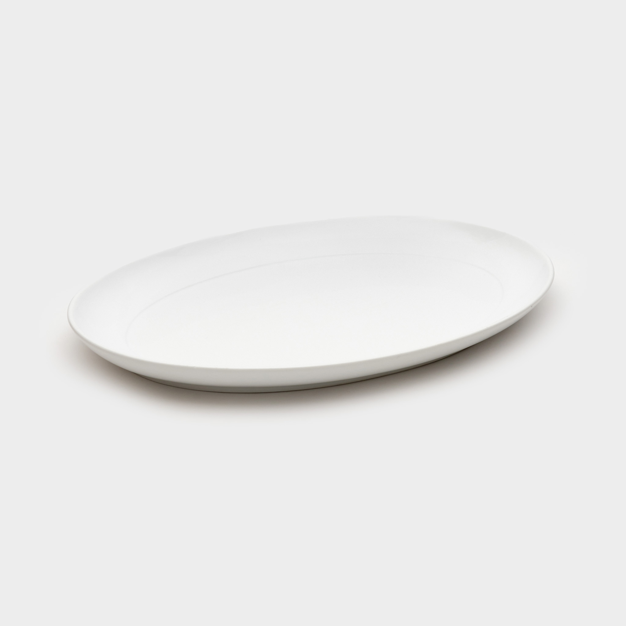 TRAVESSA OVAL PORCELANA BRANCA BORDA