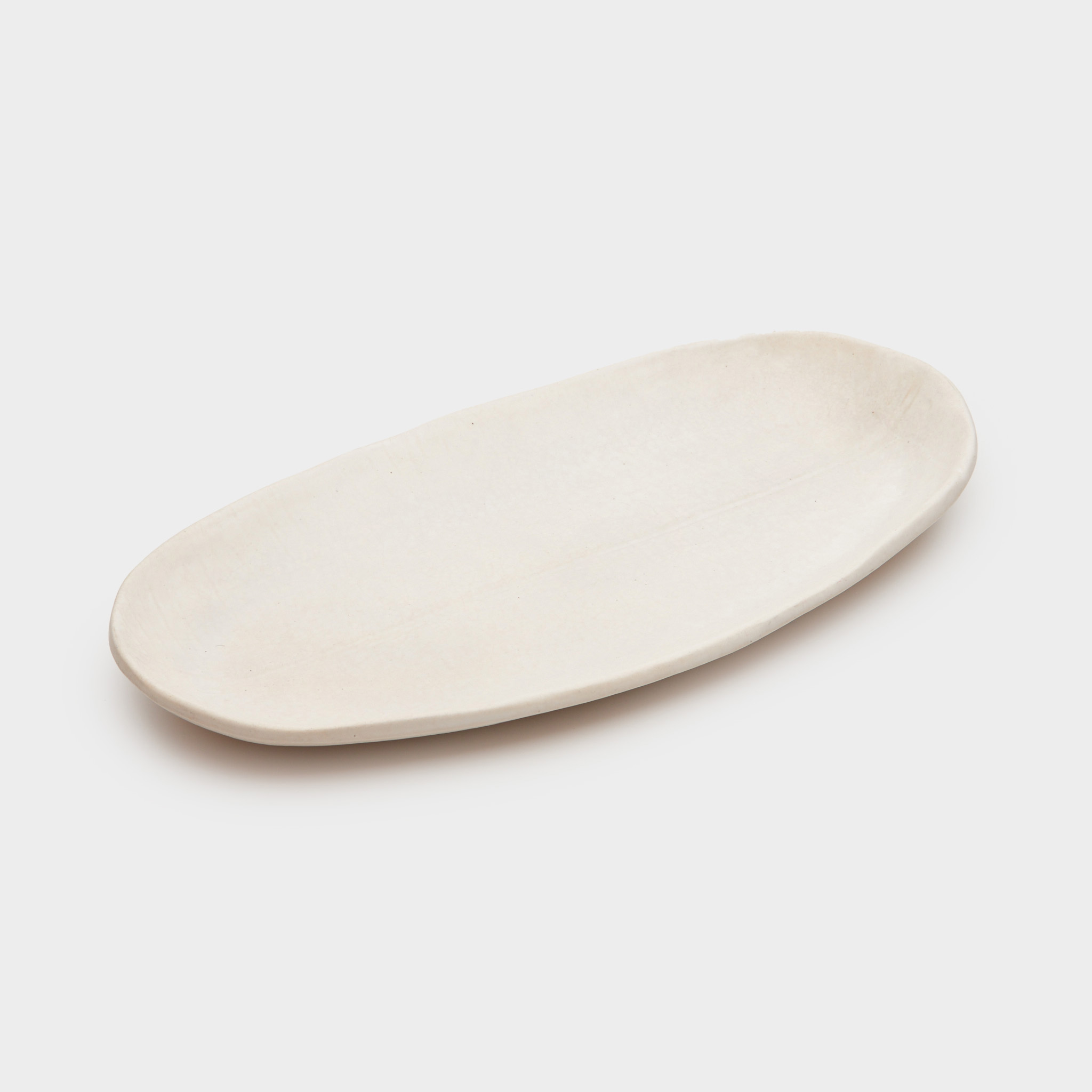 TRAVESSA CERÂMICA N.O CRU FOLHA FECHADA