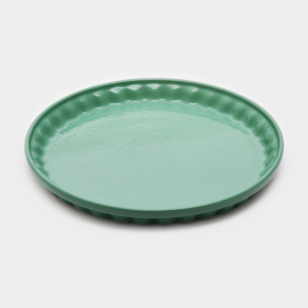 TRAVESSA REDONDA PORCELANA PISTACHE ONDULADA
